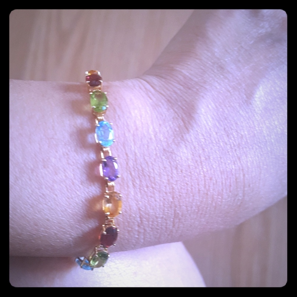 14k multi stones gold braclete